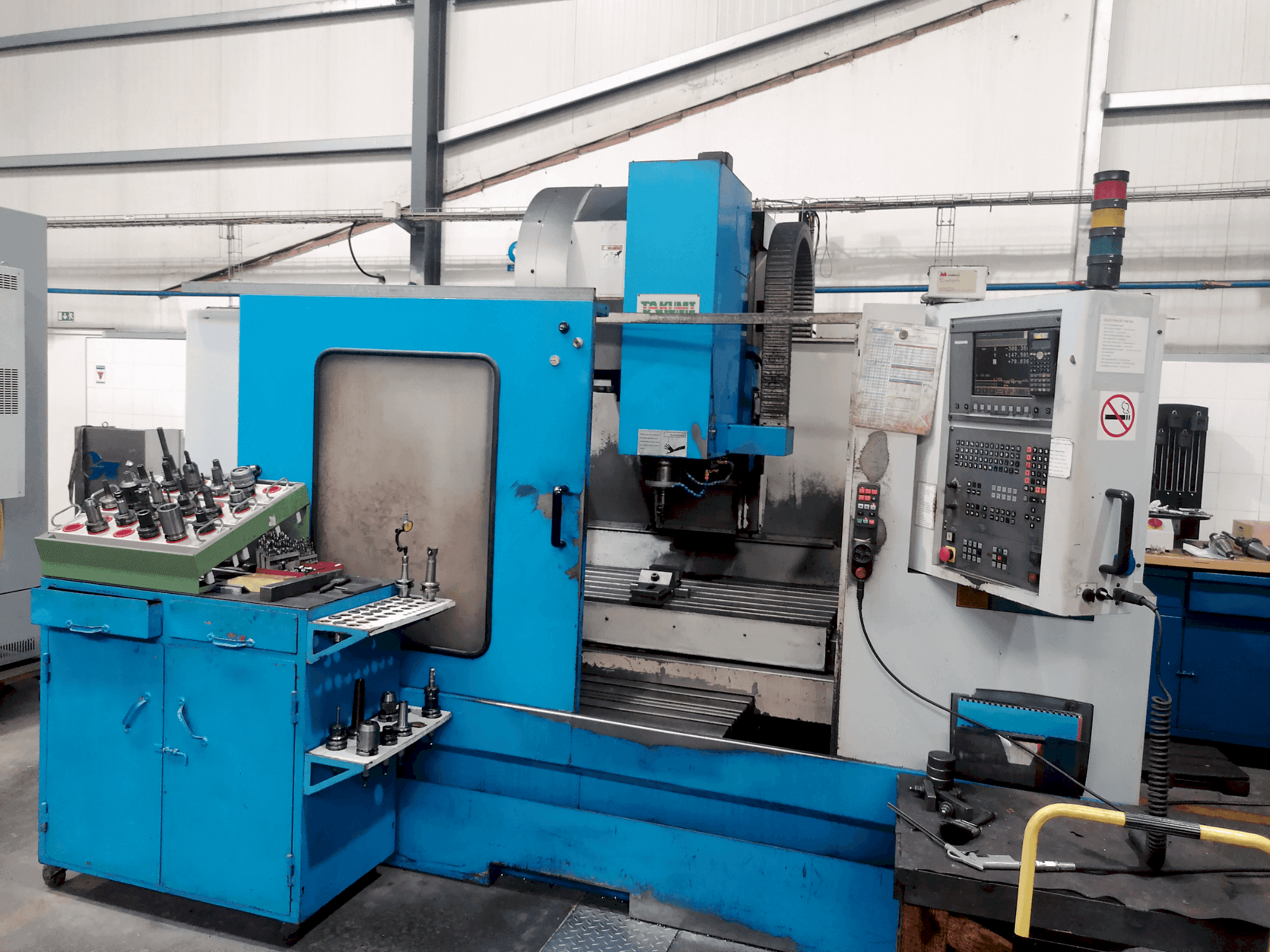 Takumi V11-maskinen framifrån