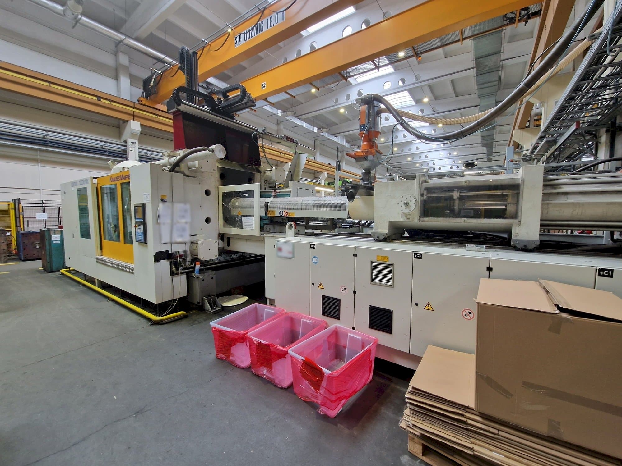 Krauss Maffei 1100-12000 MX-maskinen framifrån