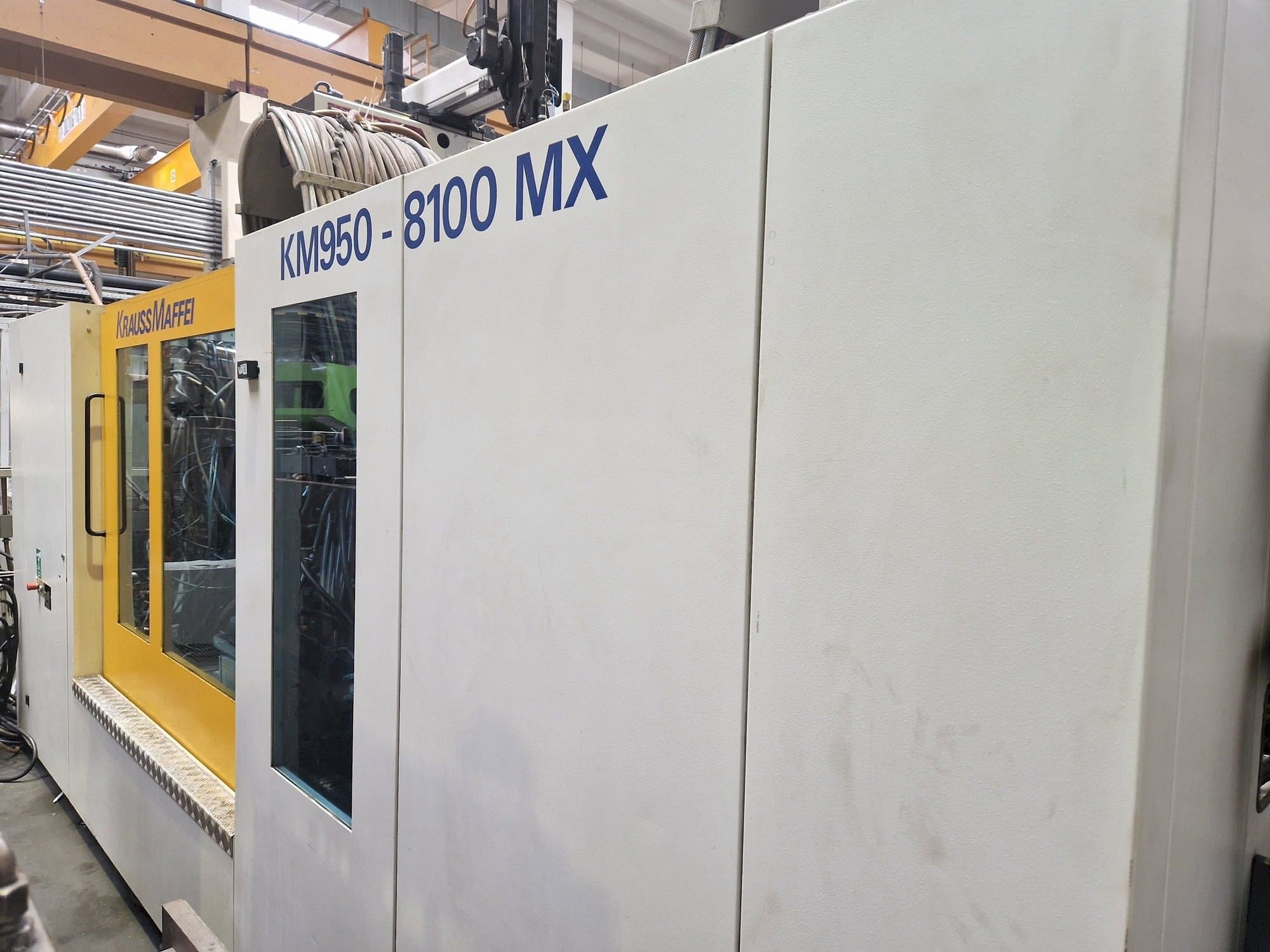 Krauss Maffei 950-8100 MX-maskinen framifrån