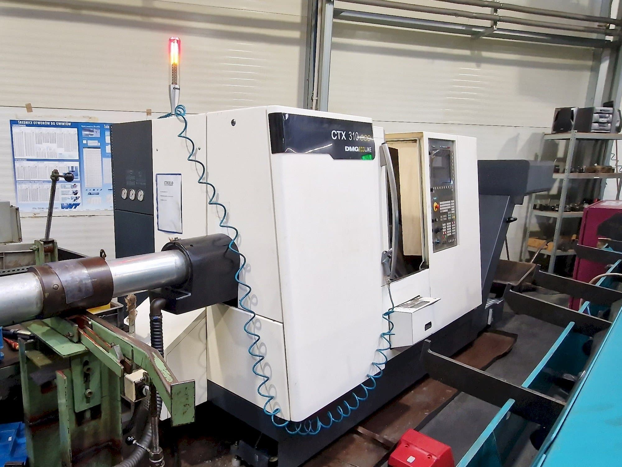 DMG CTX 310 ecoline-maskinen sedd från vänster sida