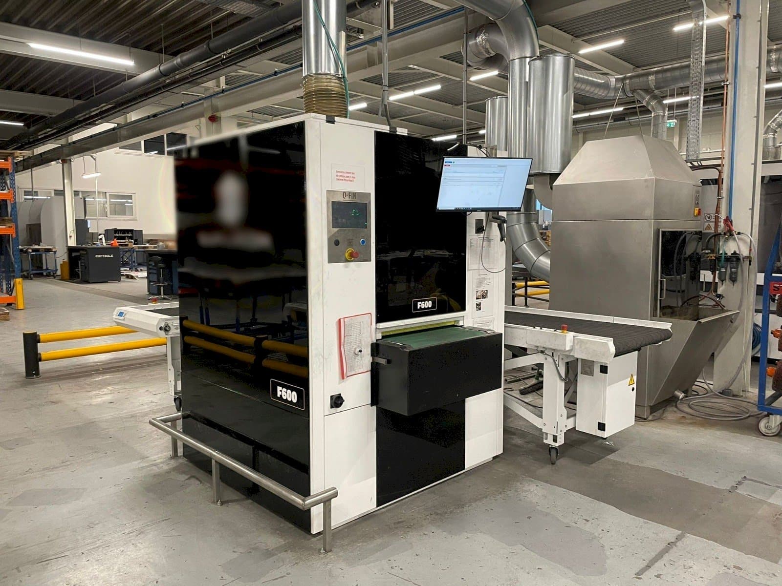 Q-FIN F600-maskinen framifrån