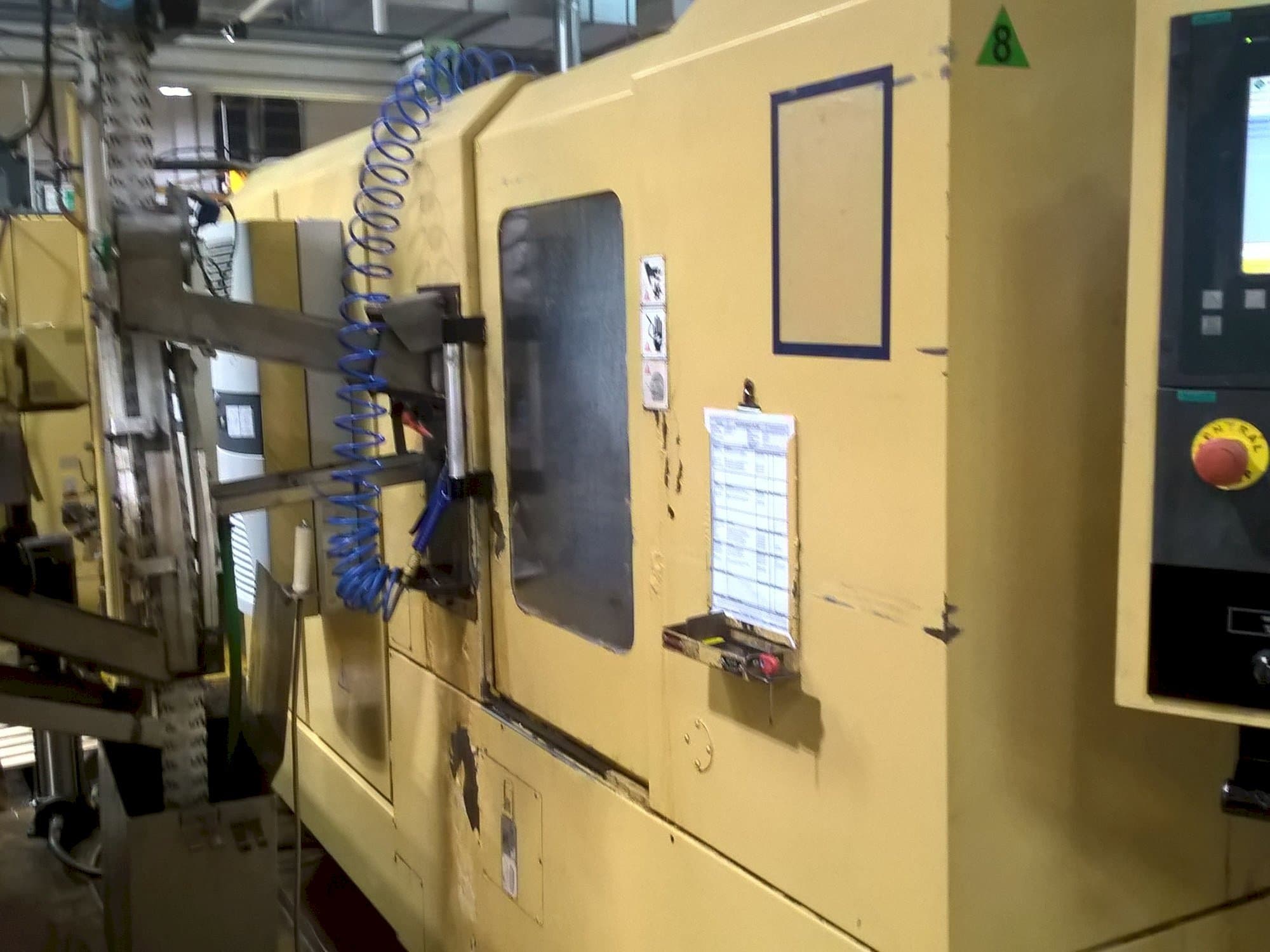 TAJMAC-ZPS SAL 100/4-maskinen sedd från höger sida