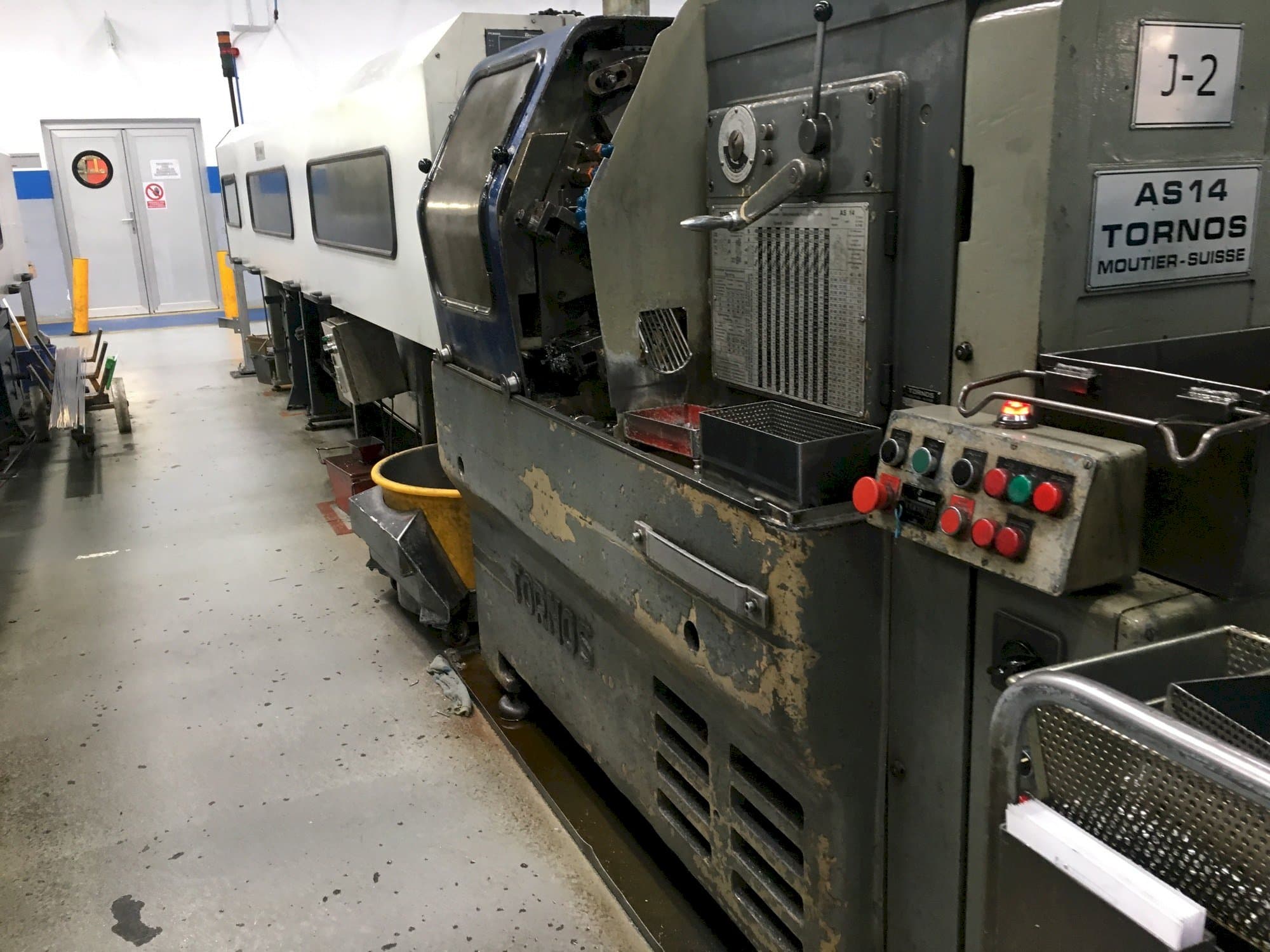 Tornos-Moutier Suisse AS 14-maskinen framifrån