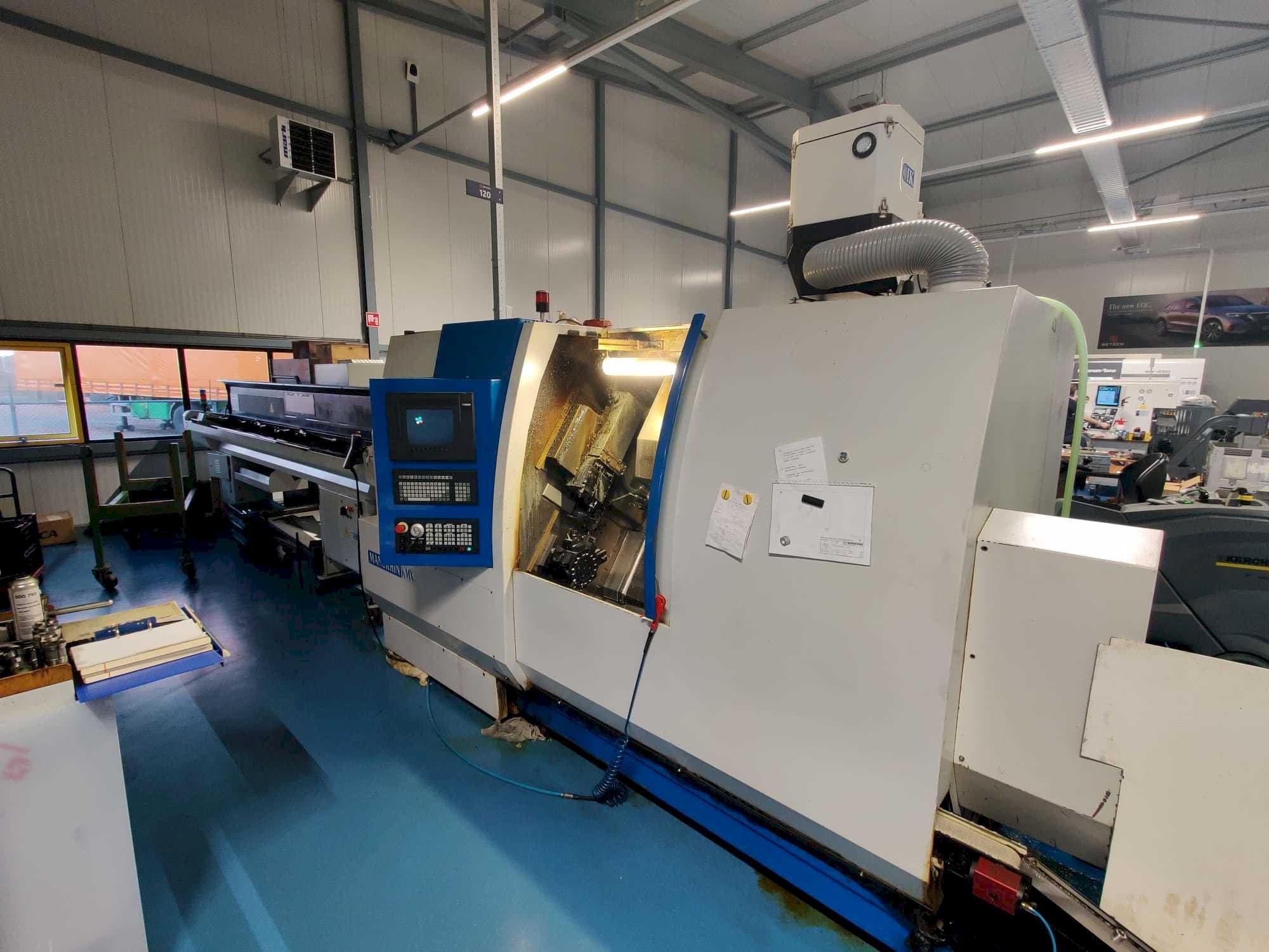 Manurhin K'MX XL 32-maskinen framifrån