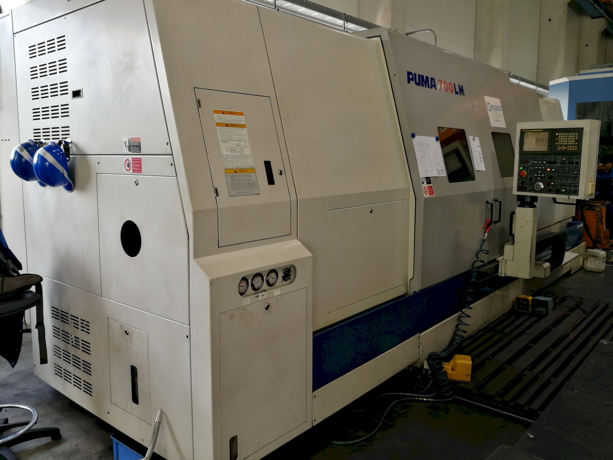 Doosan-maskinen sedd från vänsterPuma 700 LM