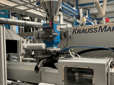Krauss Maffei 125-520 C1-maskinen framifrån