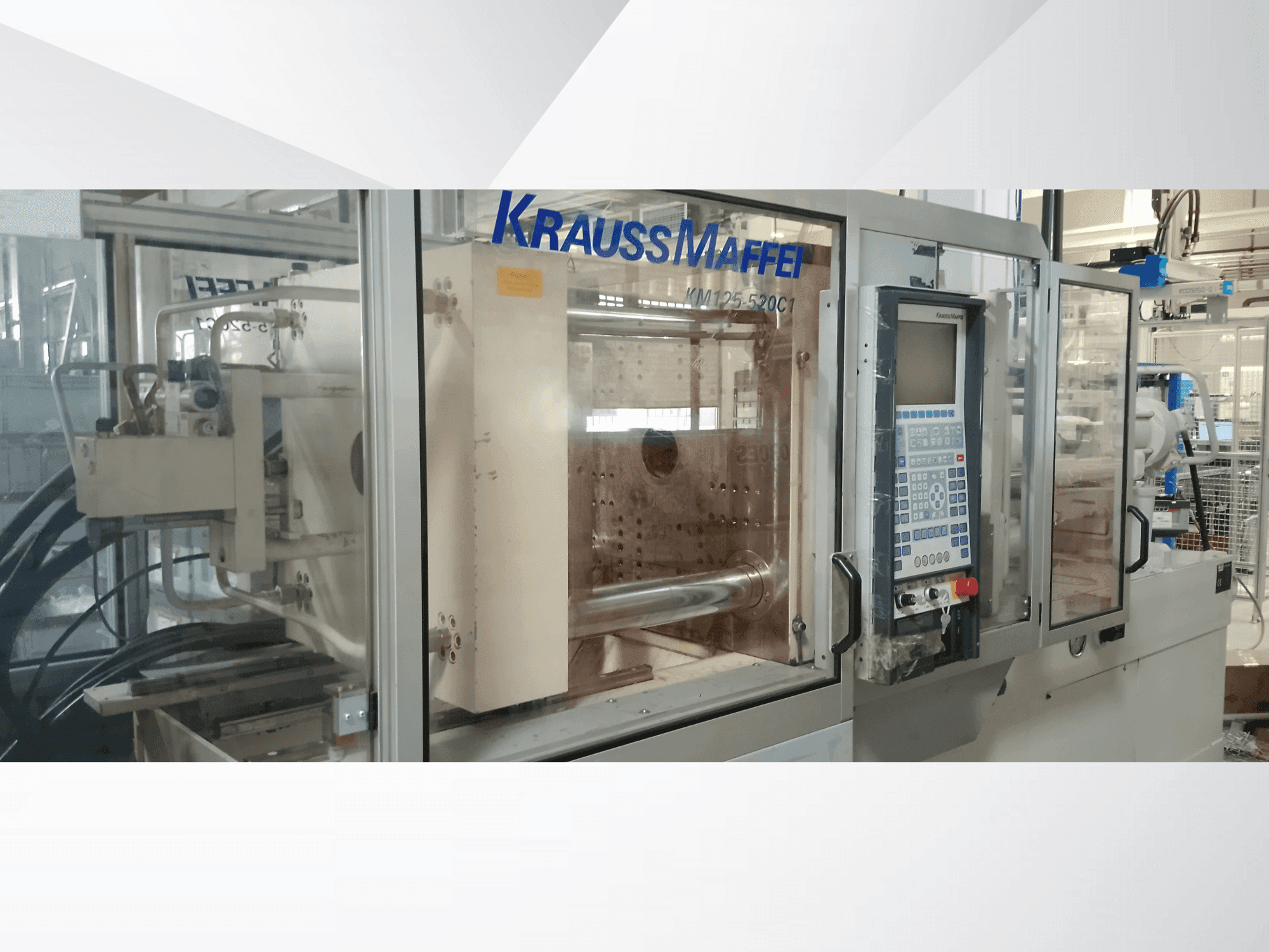 Krauss Maffei 125-520 C1-maskinen framifrån