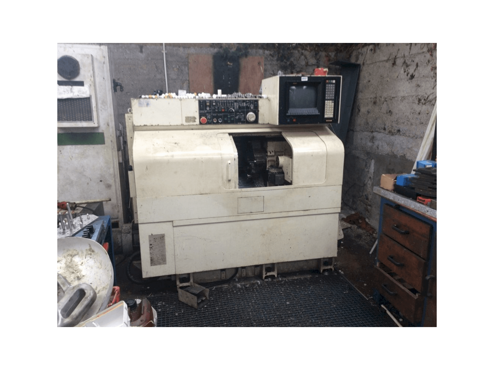 NAKAMURA-TOME TMC-15-maskinen framifrån