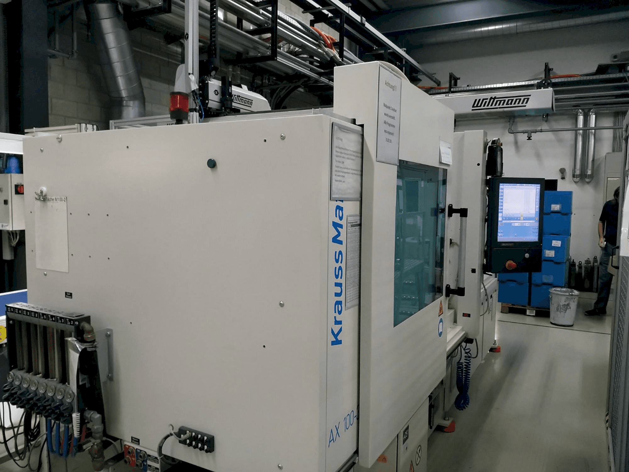Krauss Maffei 100-380 AX-maskinen framifrån
