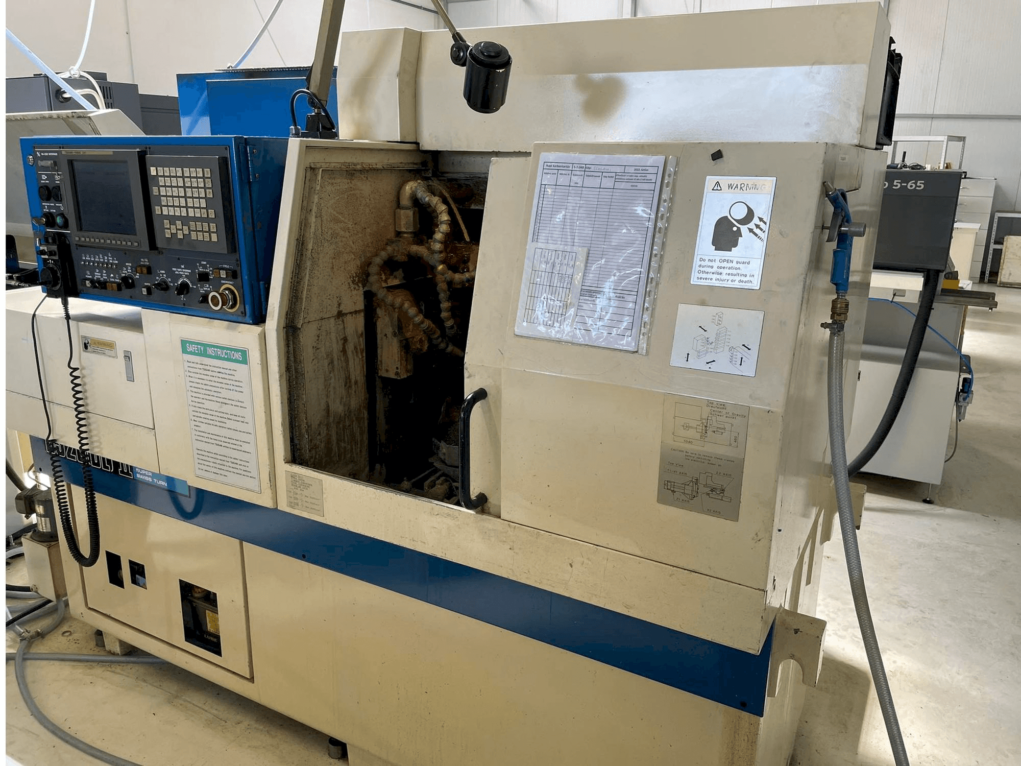 TSUGAMI BS20-II-maskinen sedd från höger sida