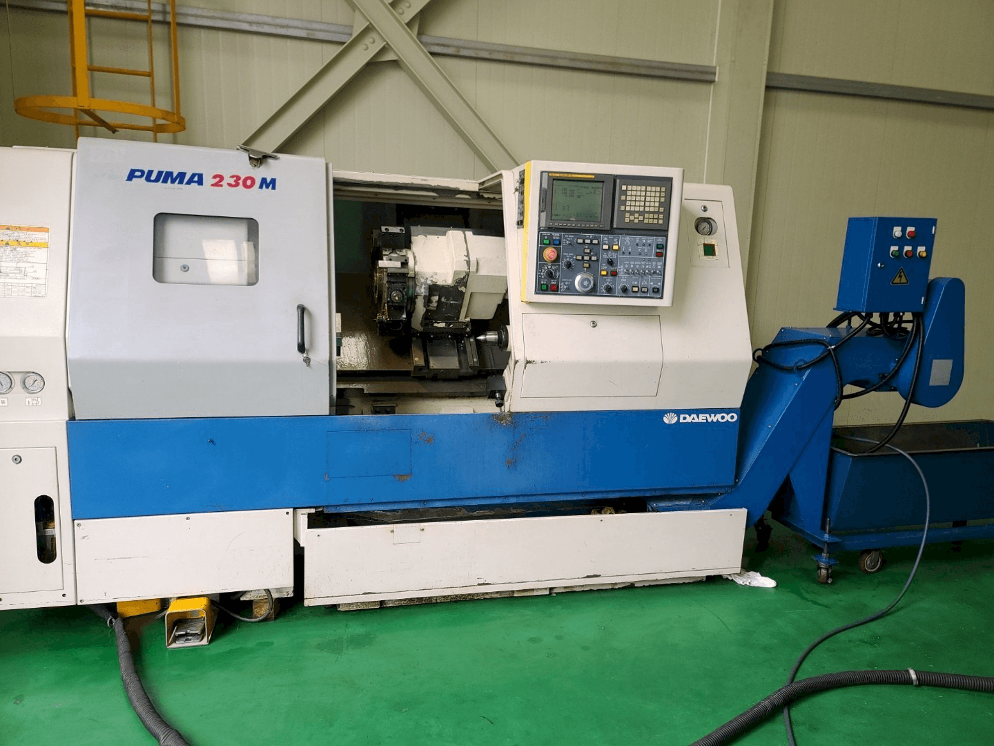 Doosan PUMA 230MB-maskinen framifrån