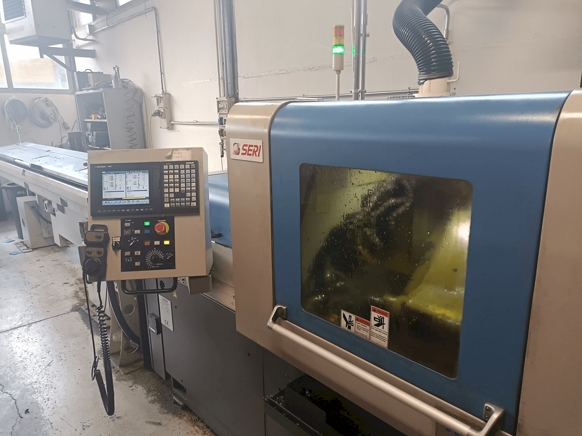 NOMURA -maskinen framifrån