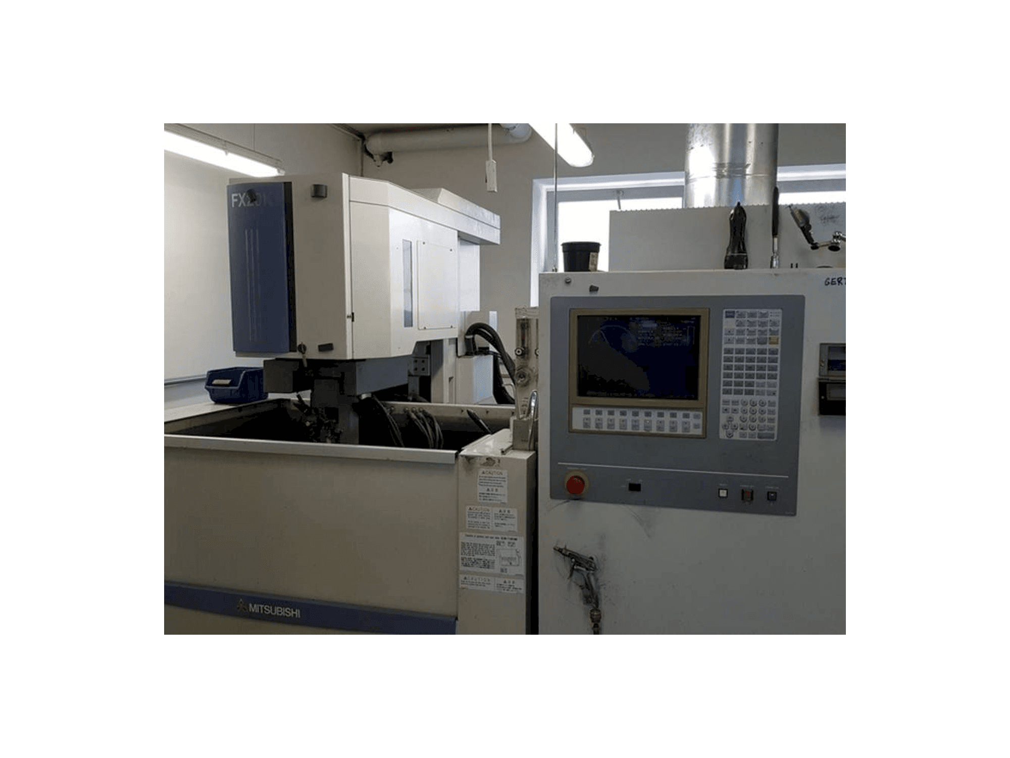 Mitsubishi FX 20-maskinen framifrån