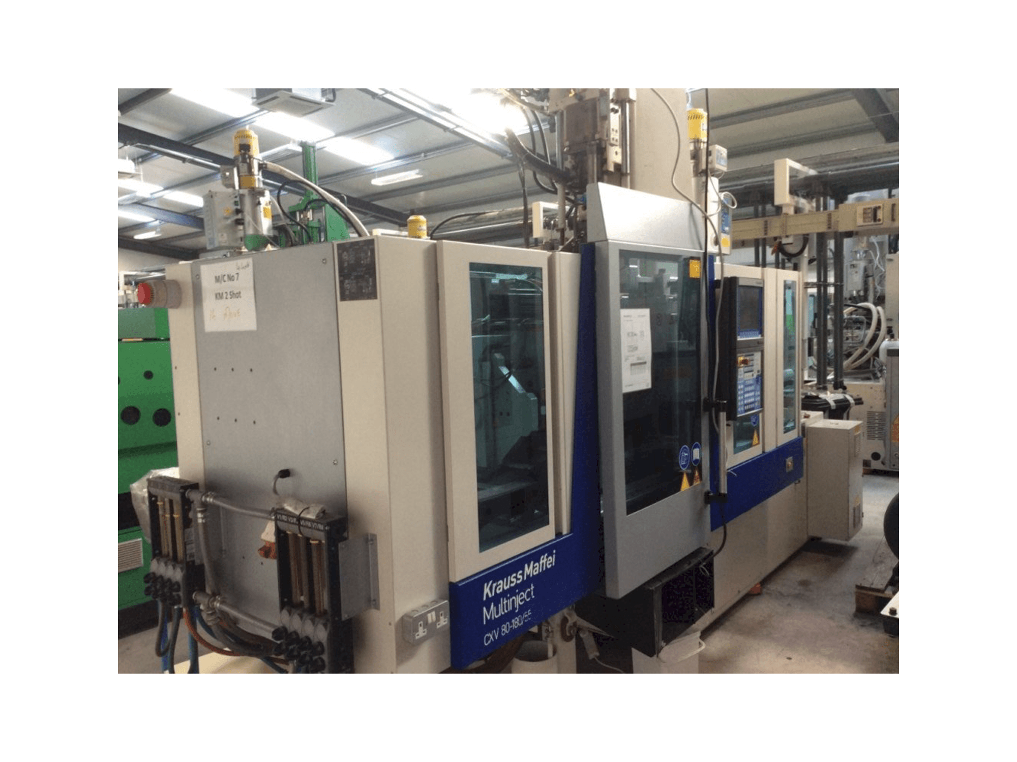 Krauss Maffei Multinject 80-180-55 CX V-maskinen framifrån