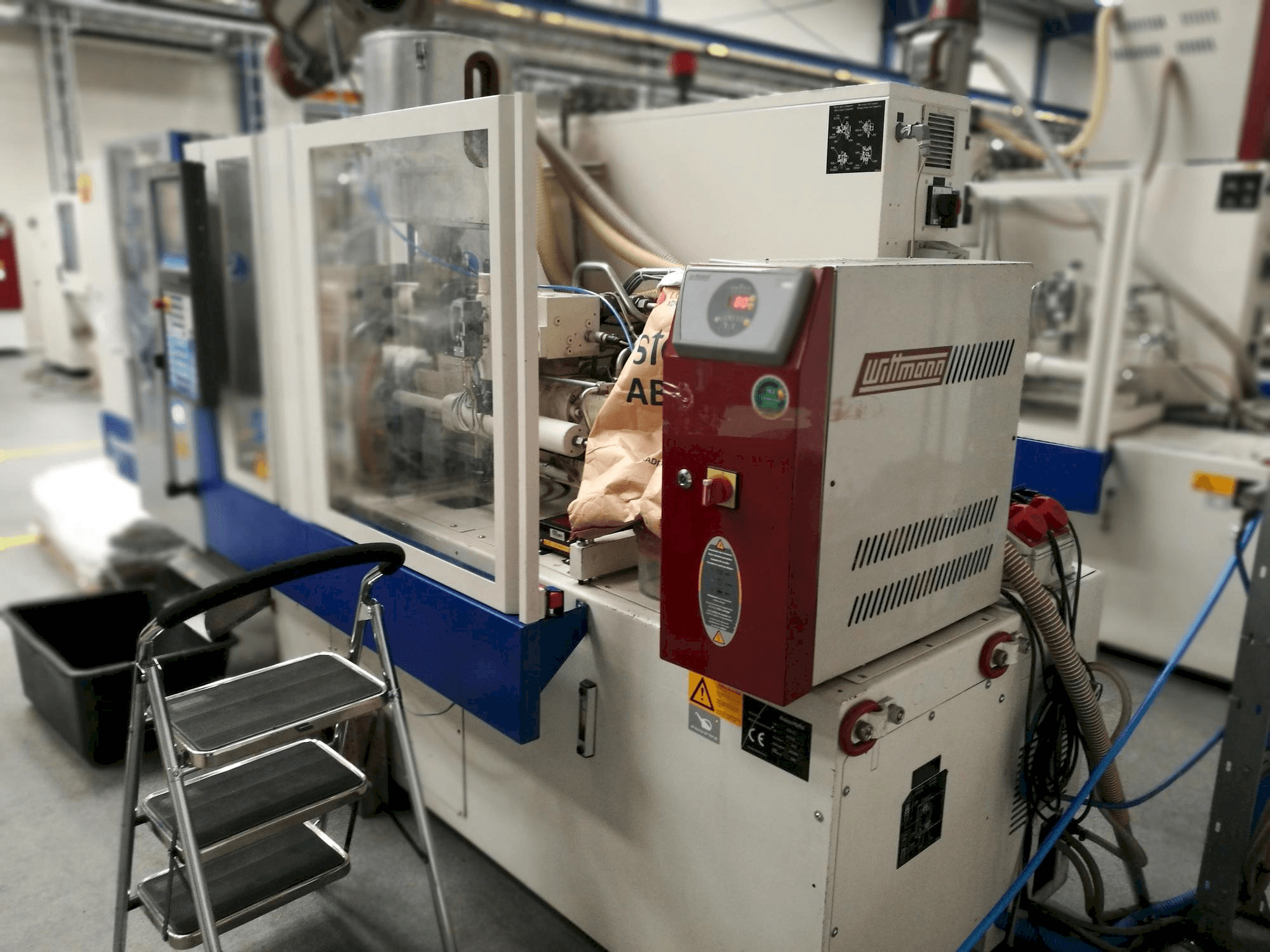 Krauss Maffei KM 35-55 CX-maskinen framifrån